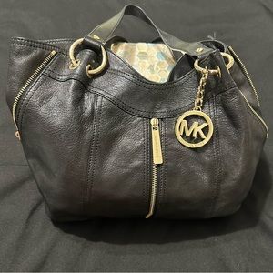 Michael Kors Black Leather Hobo Style Purse with Expandable Zippers